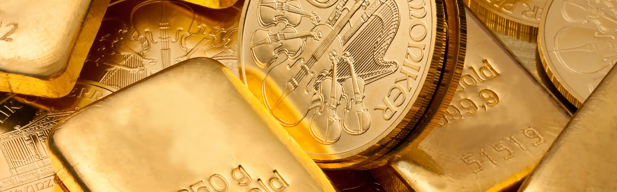 Goldbarren und Goldmünzen